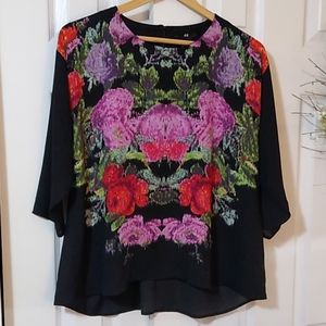 Gorgeous black top with front floral print